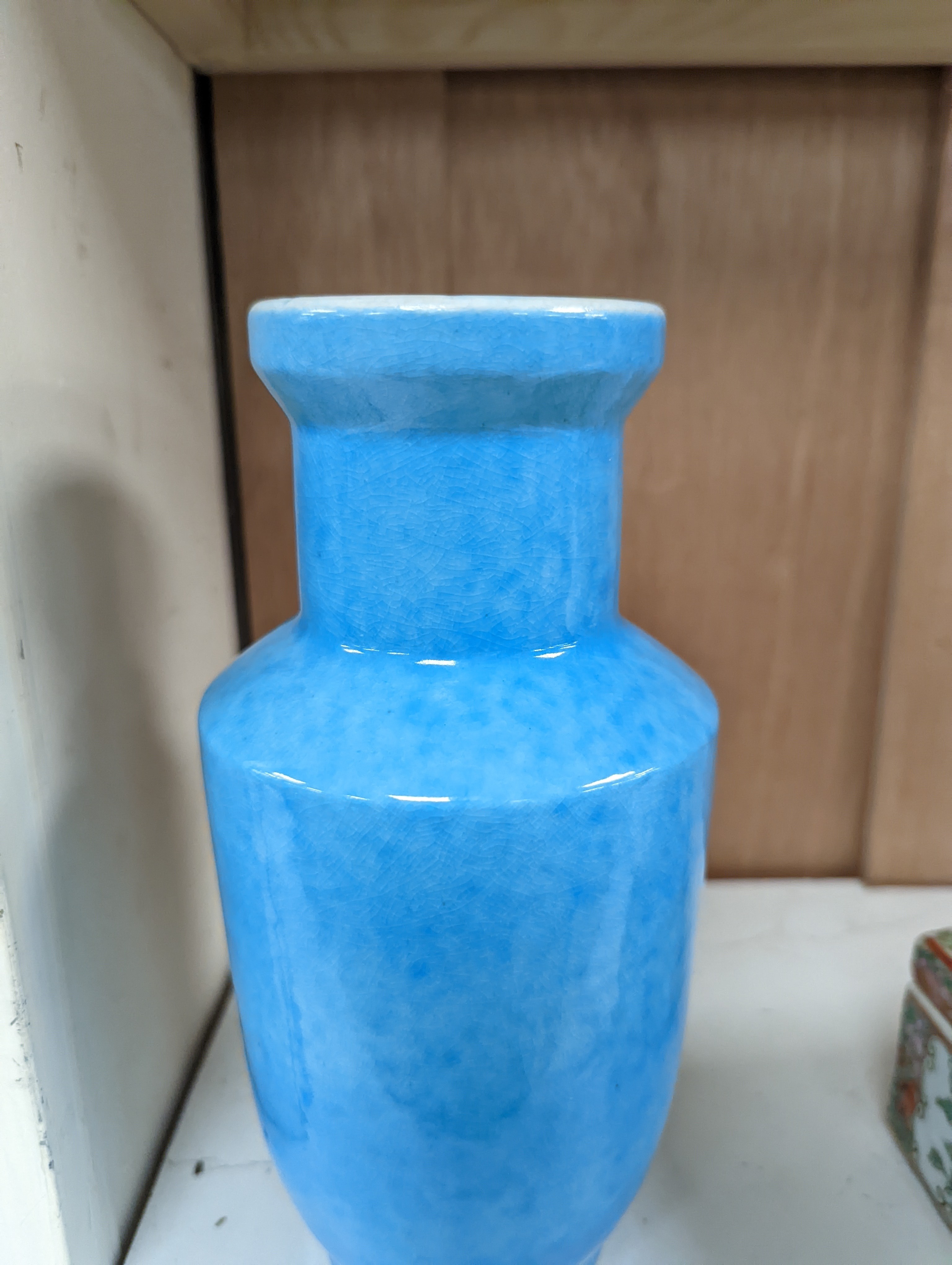 A Chinese turquoise glazed vase 22cm, with a fine crackle to the exterior glaze